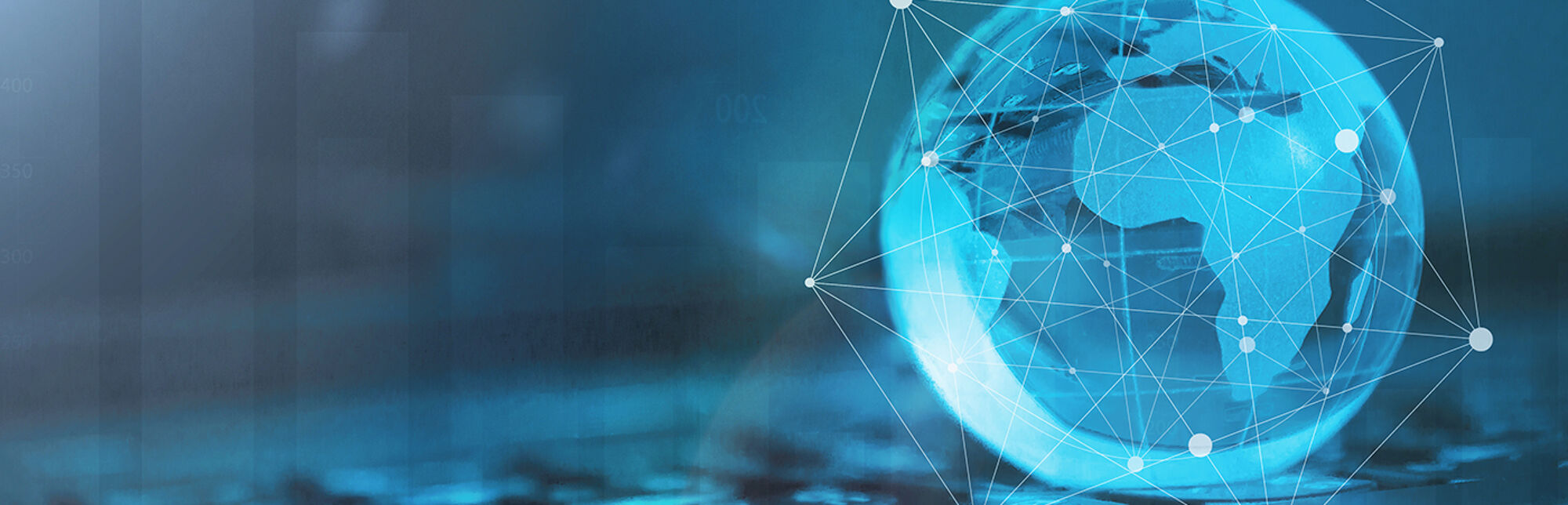 A blue globe on a keyboard to as an international business concept 