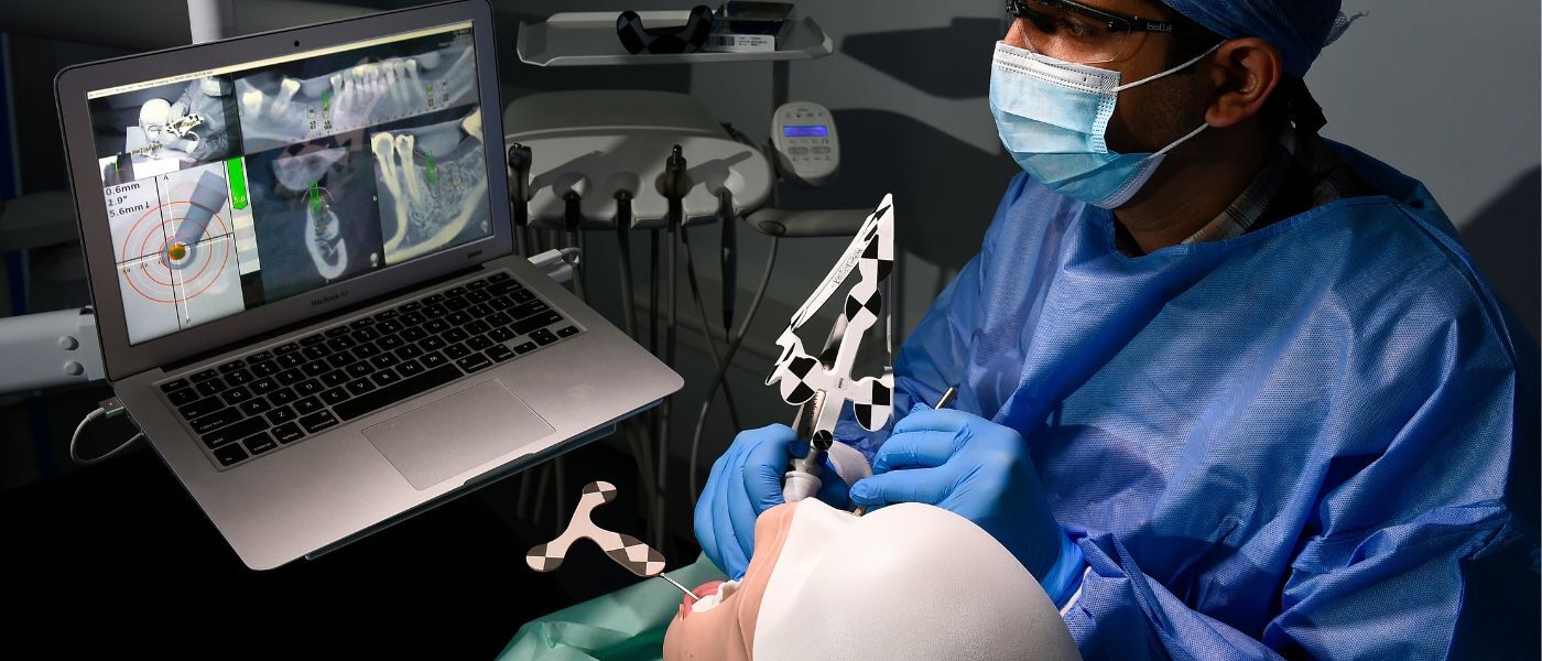 A postgraduate student performing a procedure.