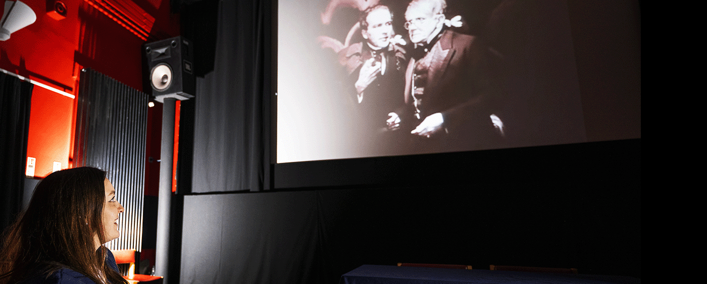 Student viewing a film in our Andrew Stuart Cinema.