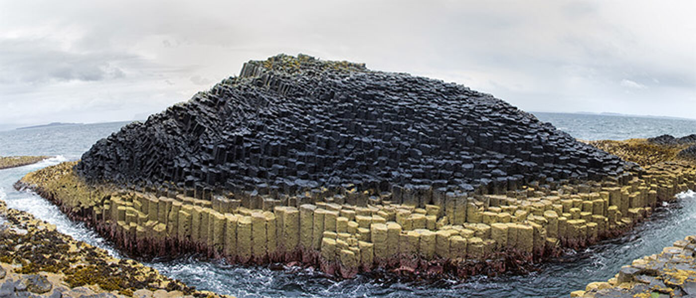 A panorama of he basalt columns of Staffa Island at Fingal s cave, Inner Hebrides, Scotland.