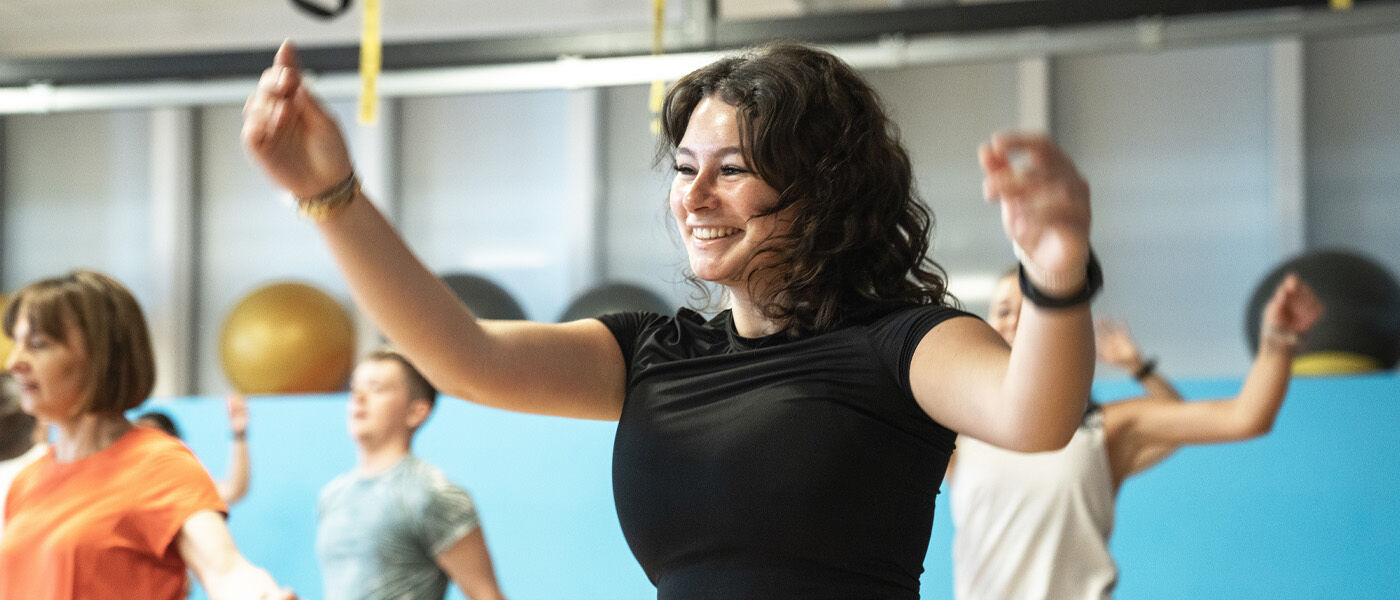 Amy dancing in a Beats Class