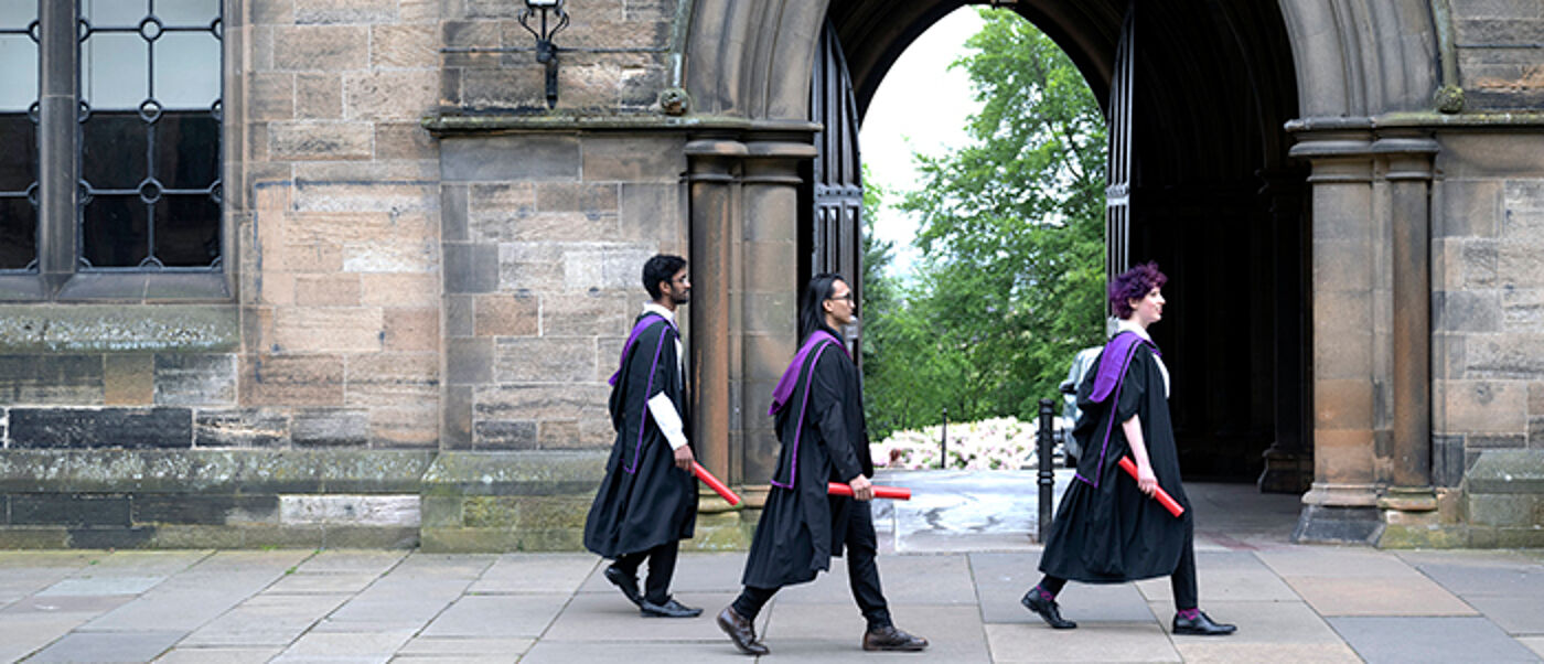 Students graduating Gilbert Scott