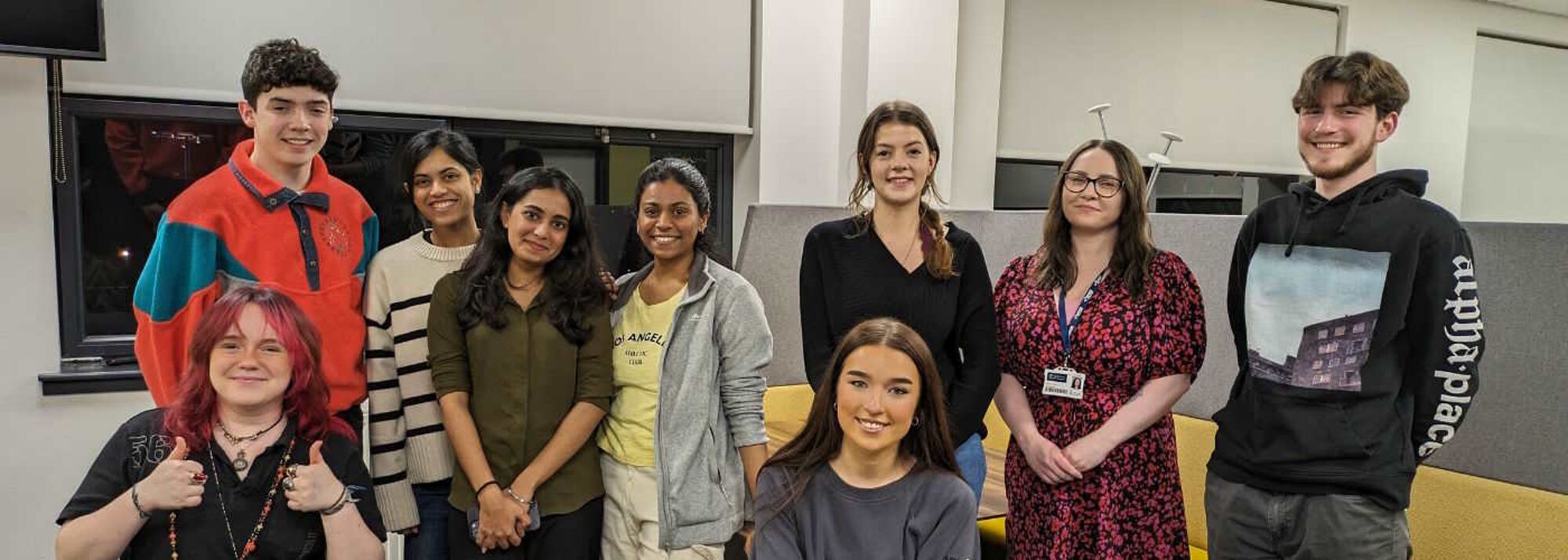 Group of student callers smiling together