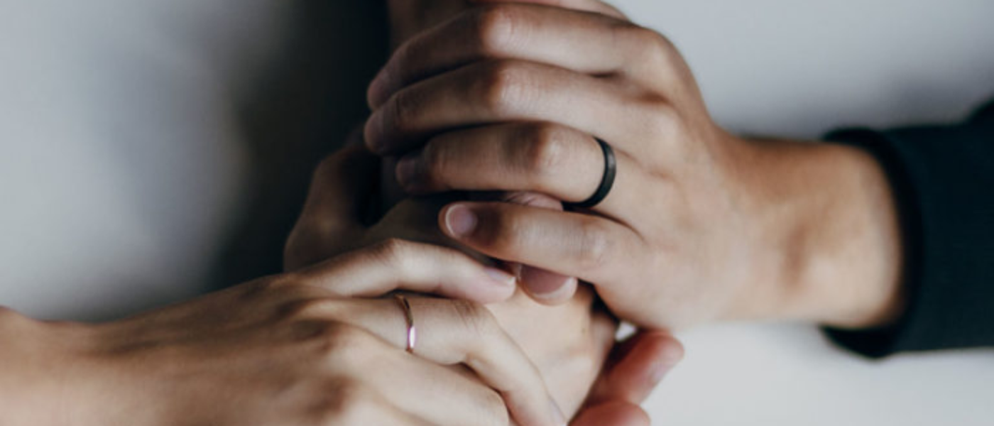 Stock image of hands holding