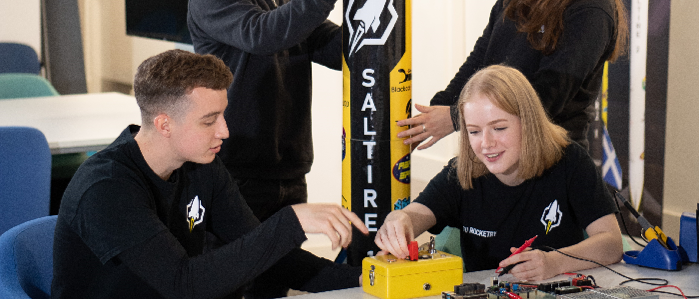 Students with engineering rocket