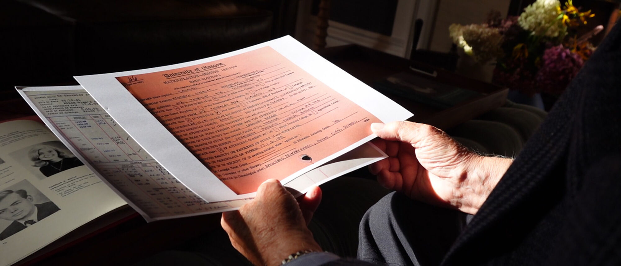 Prof Kenneth Calman examining his degree from the University of Glasgow