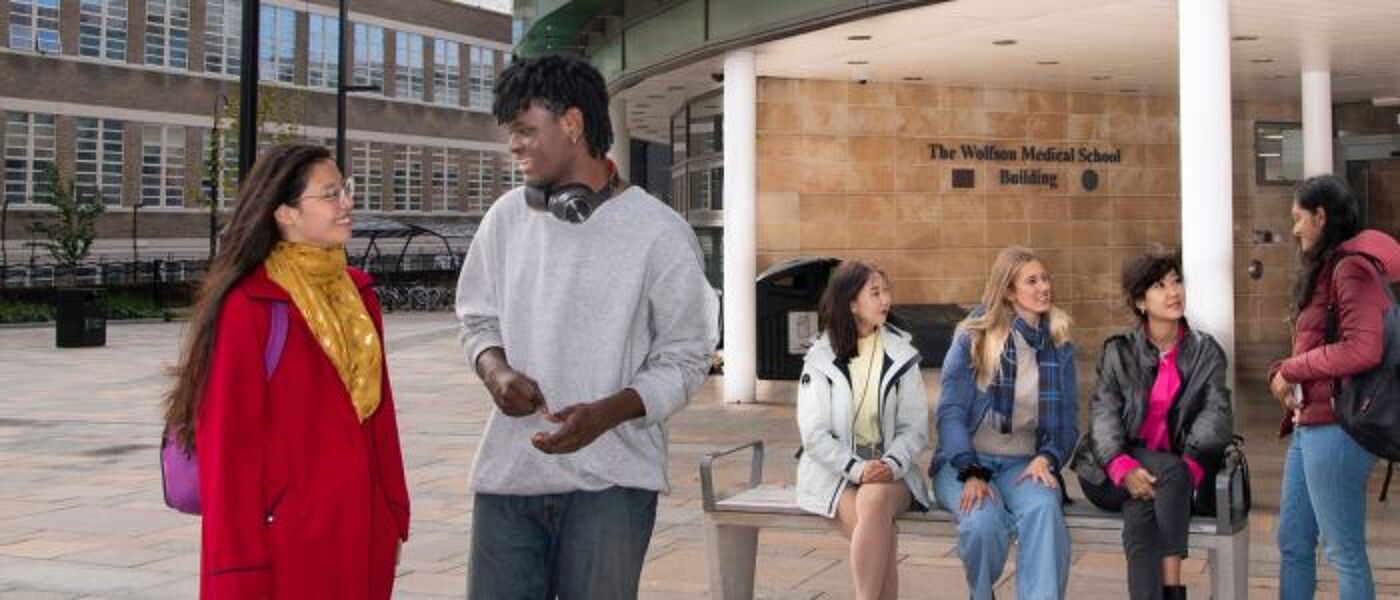Students chatting at the Wolfson Medical School Building