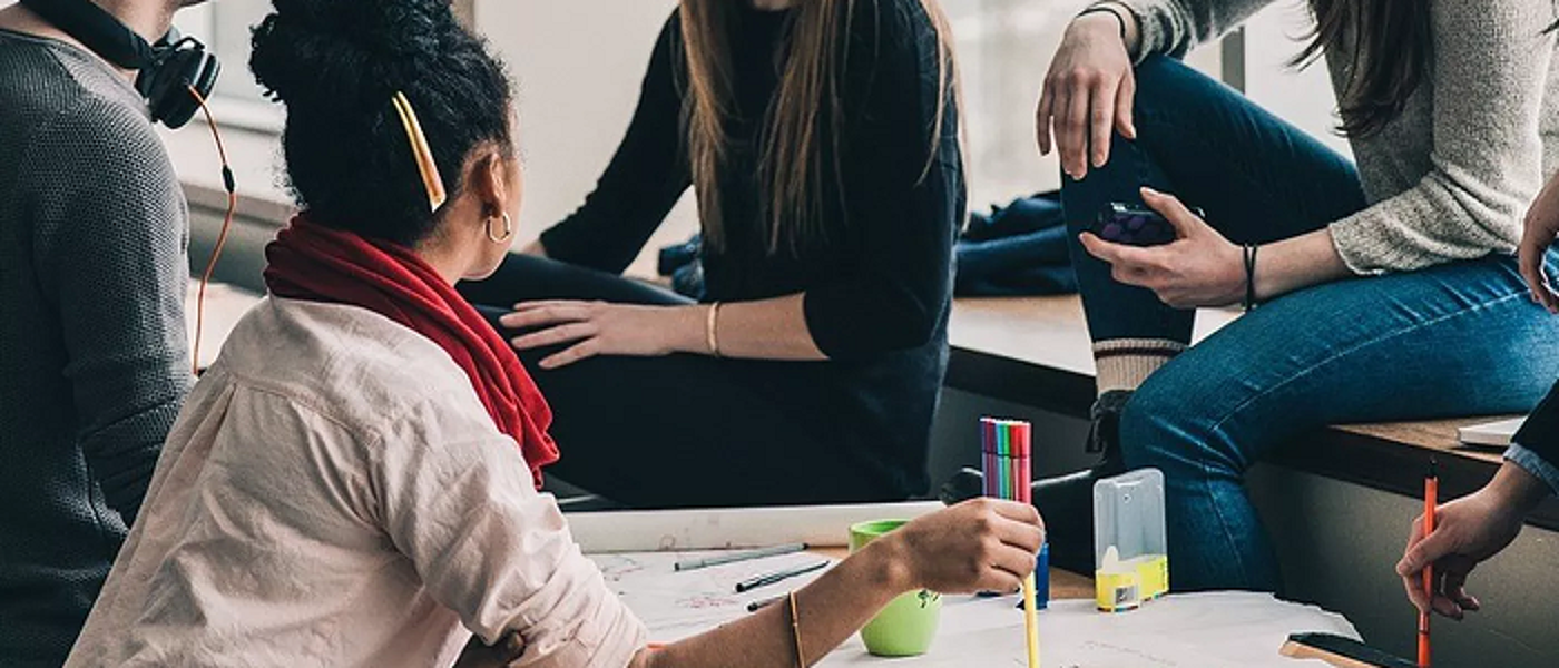 Students socialising at a table