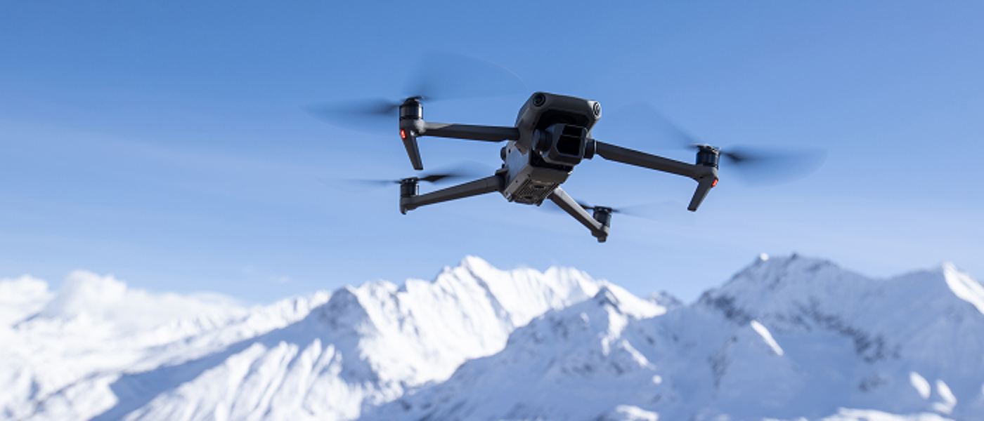 Drone flying with snow in background