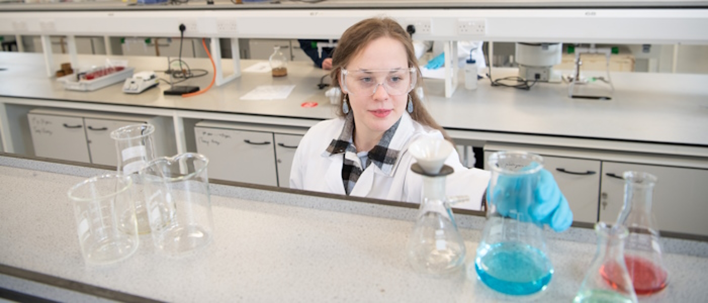 Chemistry student in lab coat