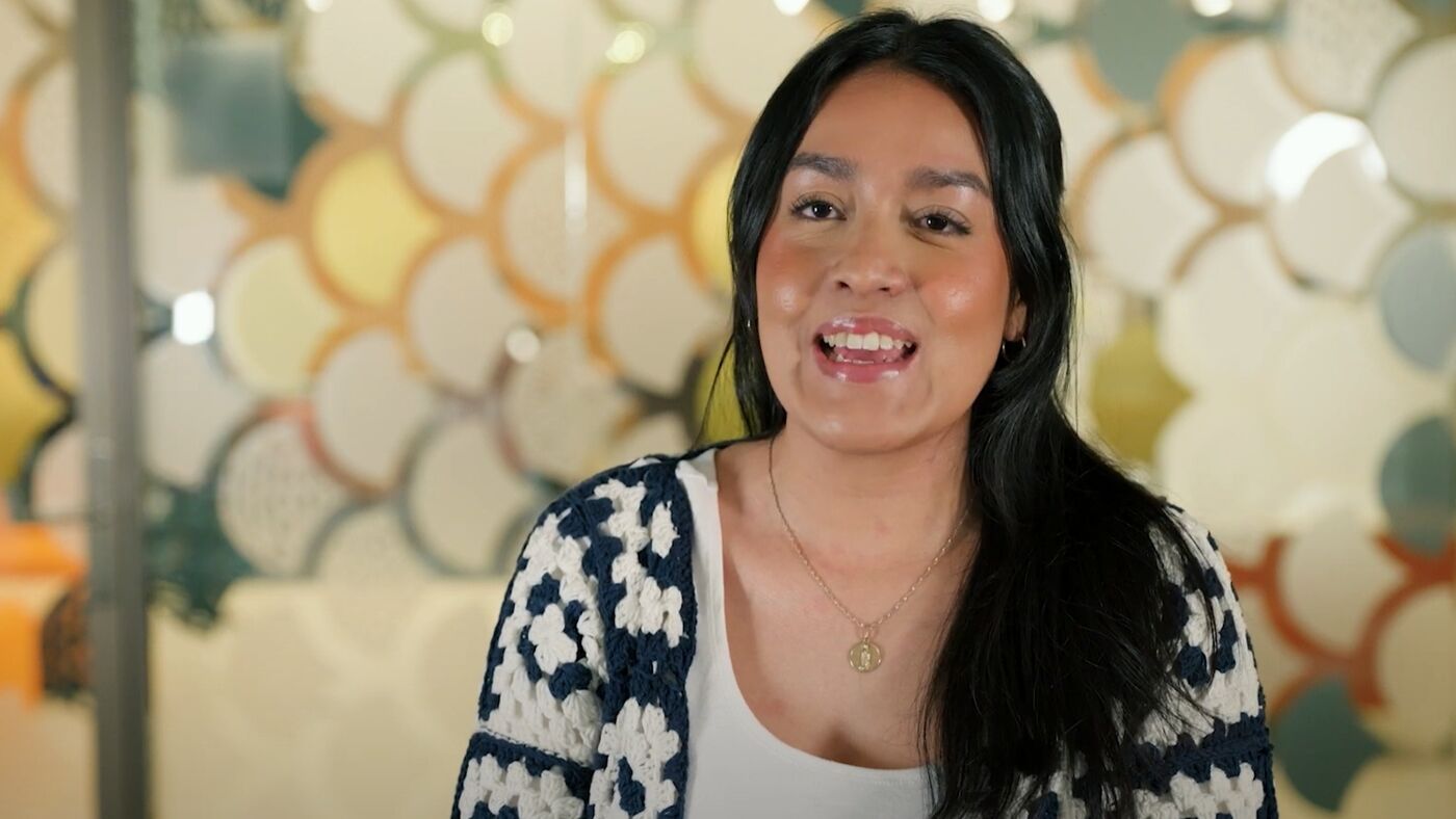 student sitting smiling