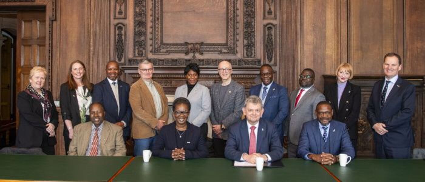 A group photo of representatives from the University of Glasgow, Kamuzu University of Health Sciences, the Scotland-Malawi Partnership, the Scottish Government and Scotland's International Development Initiative