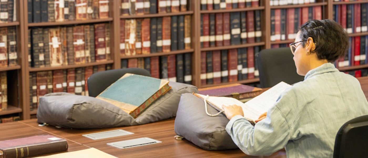 A reader consulting an item in our Thurso Street reading room