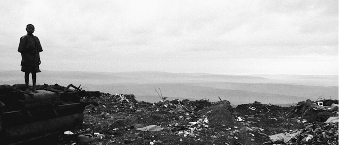 Child standing on tip 700x300