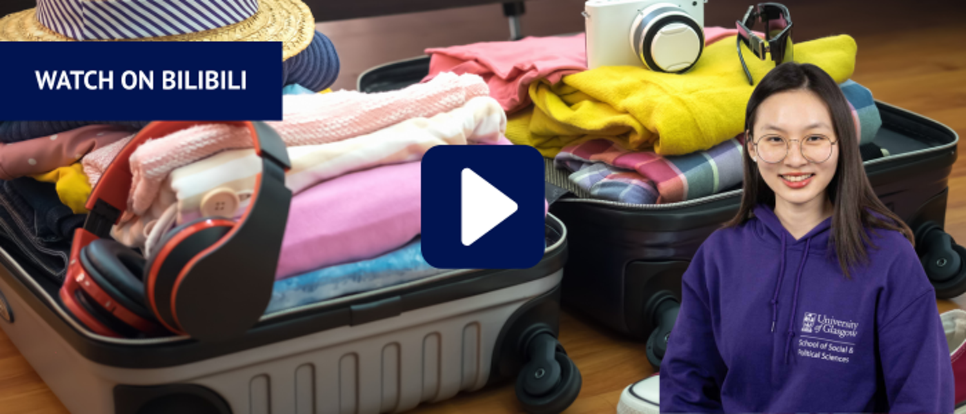 Open suitcase packed for travelling with headshot of woman