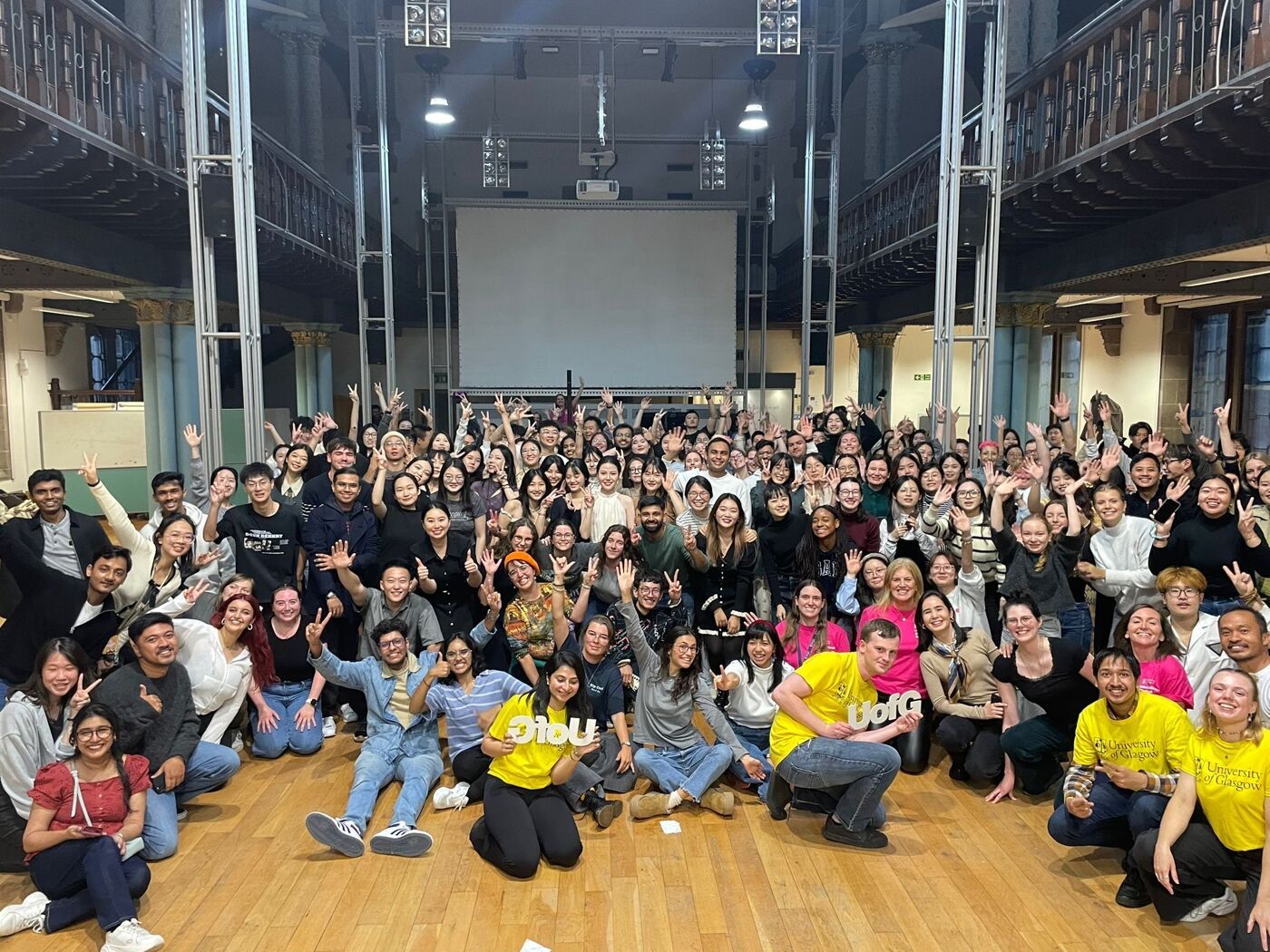 Students sitting in a large group
