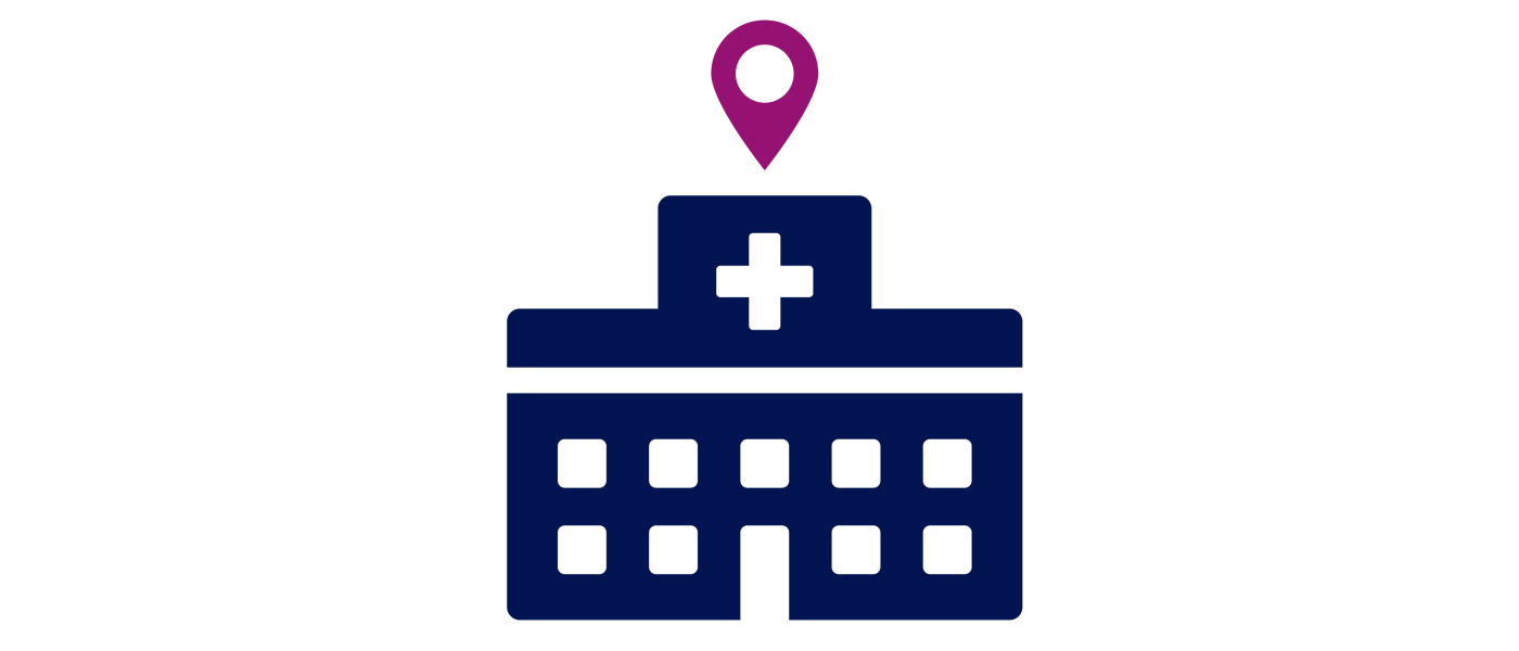 An icon of a hospital with a location pin above it