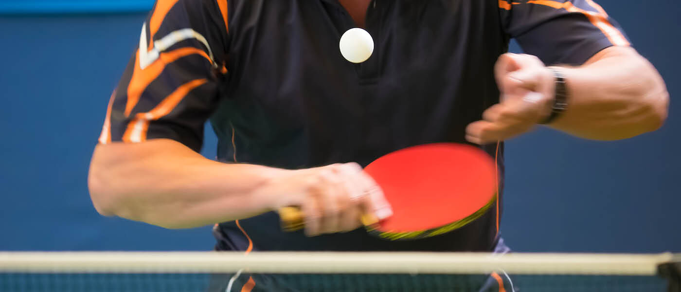 Player about to hit the ball whilst playing table tennis