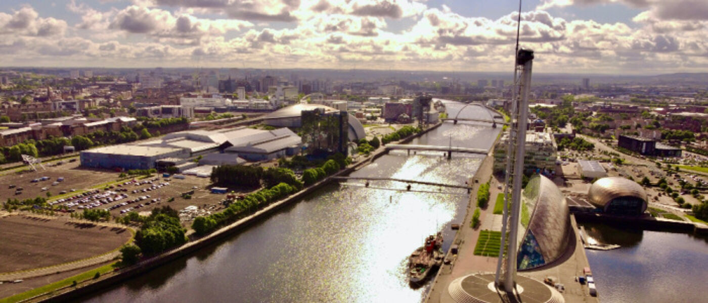 The River Clyde featuring the Scottish Event Campus (SEC). Photo by Stephen O'Donnell on Unsplash