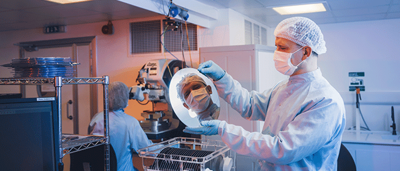 Man in lab with mirror