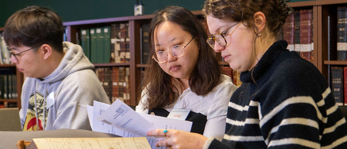 3 students taking part in a History Hackathon