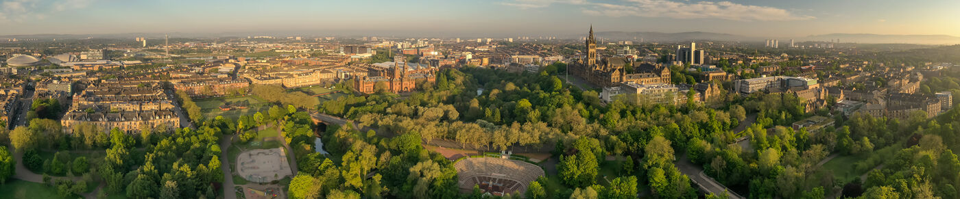 Arial view of the central campus and surrounding area, showing historical and modern building surrounded by parks and trees.
