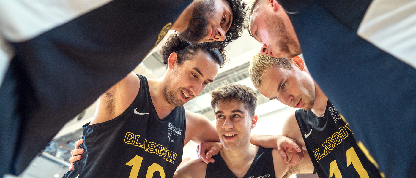 Basketball team in a huddle
