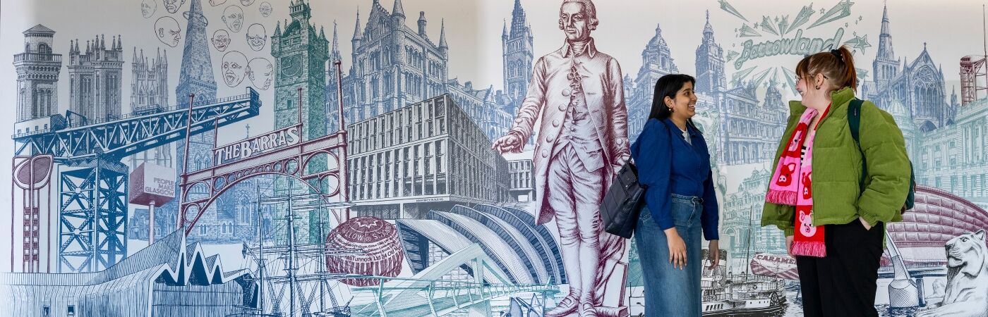 Students standing in front of a wall mural in the Adam Smith Building, Adam Smith Business School