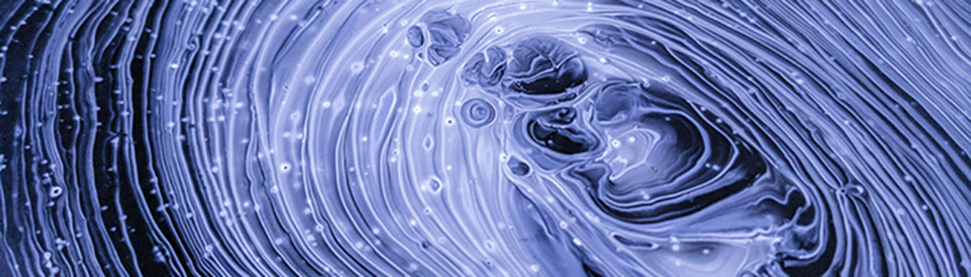 Abstract swirly purple image that looks like liquid