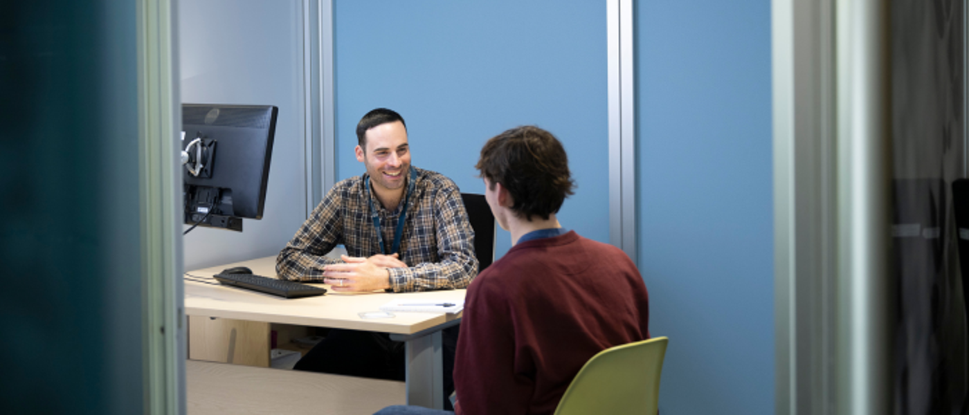 Employability services chatting with student