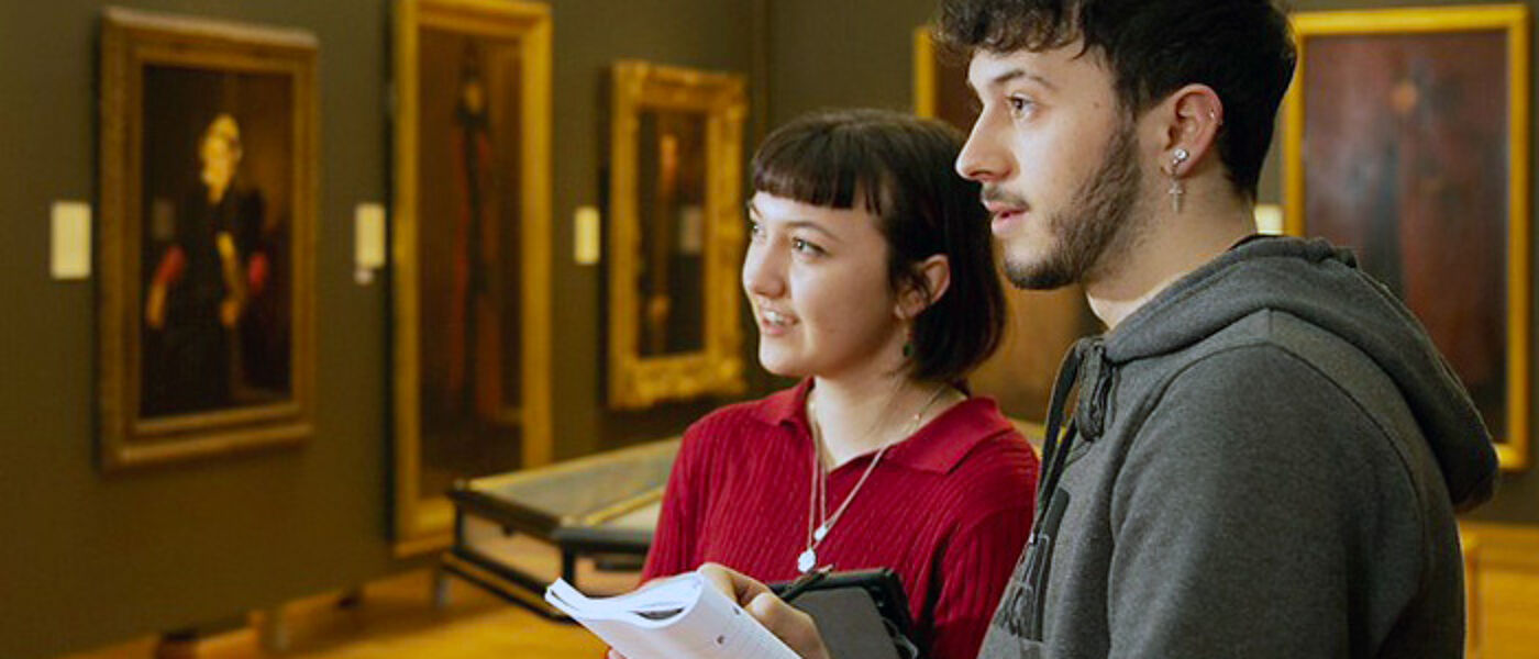 Two students in the University's art gallery