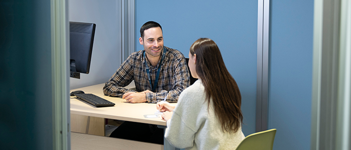 student and a student advisor meeting