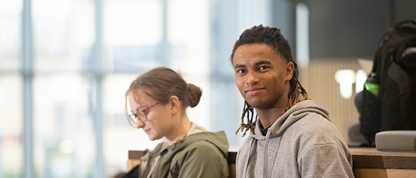 student looking to camera in JMSLH