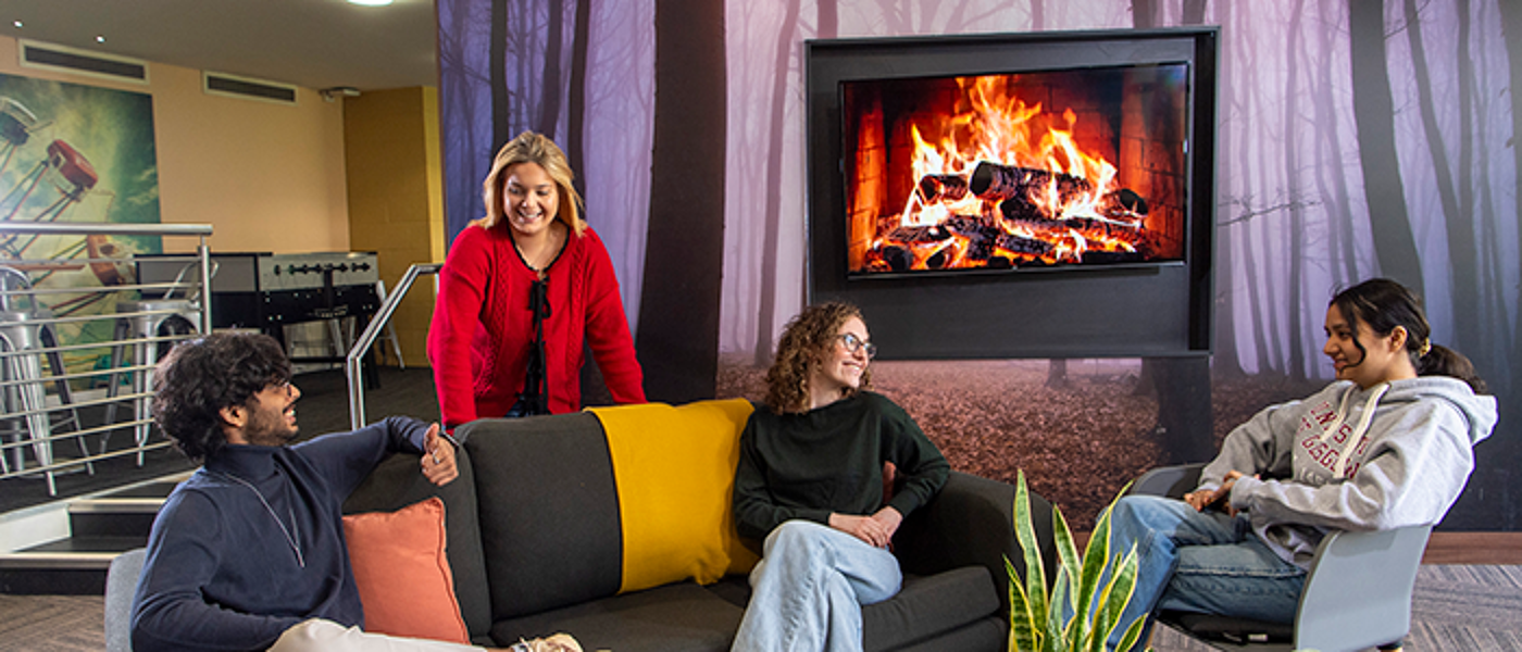 a group of students sitting in a common area of student accomodation