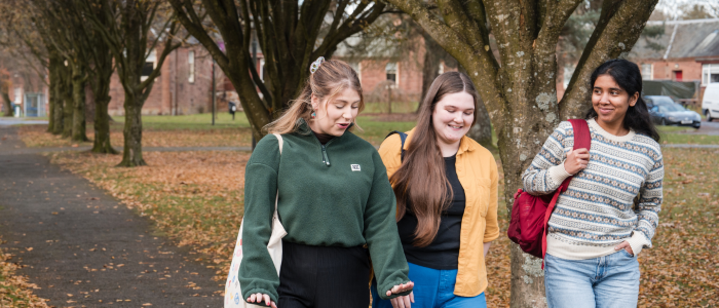 Students walking outside around campus