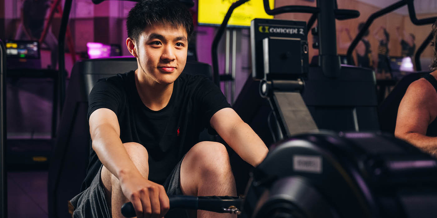 Student on a rowing machine
