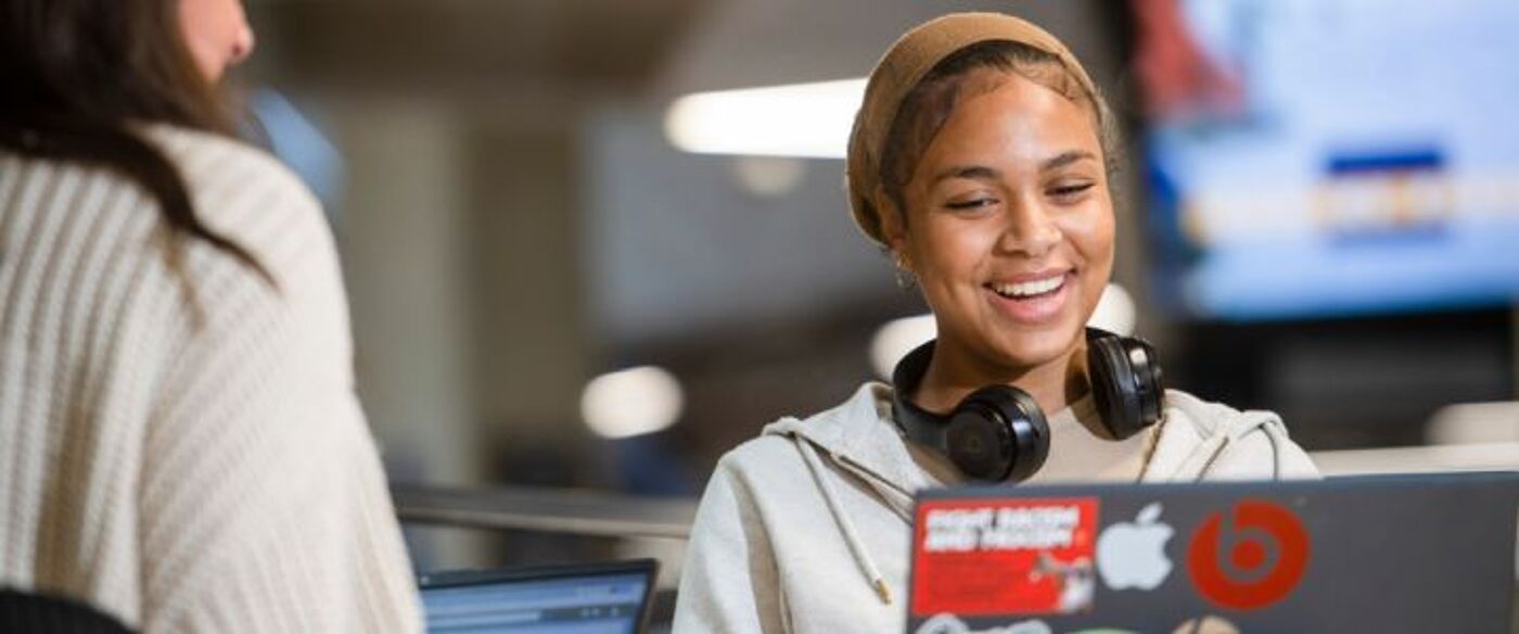 student smiling studying