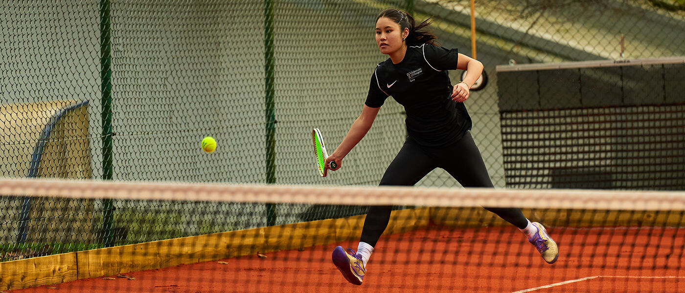 student playing tennis @ Garscube Sports Complex