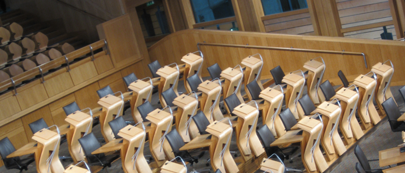 Rows of chairs and tables in the Scottish Parliament, Holyrood