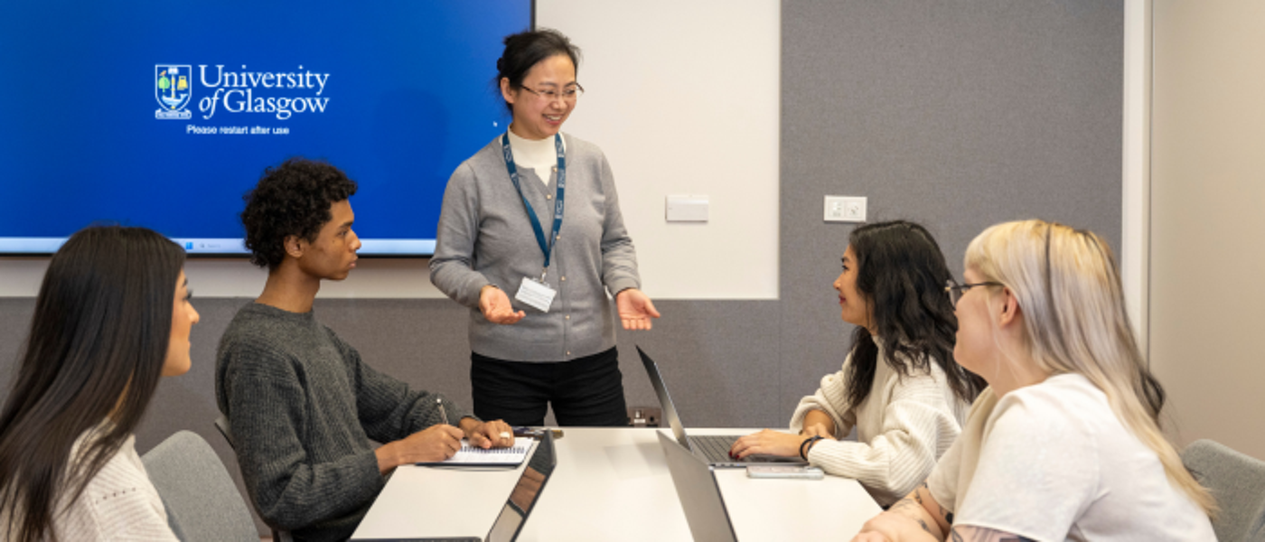 Students in a class with Urban Studies lecturer, Professor Jing Yao