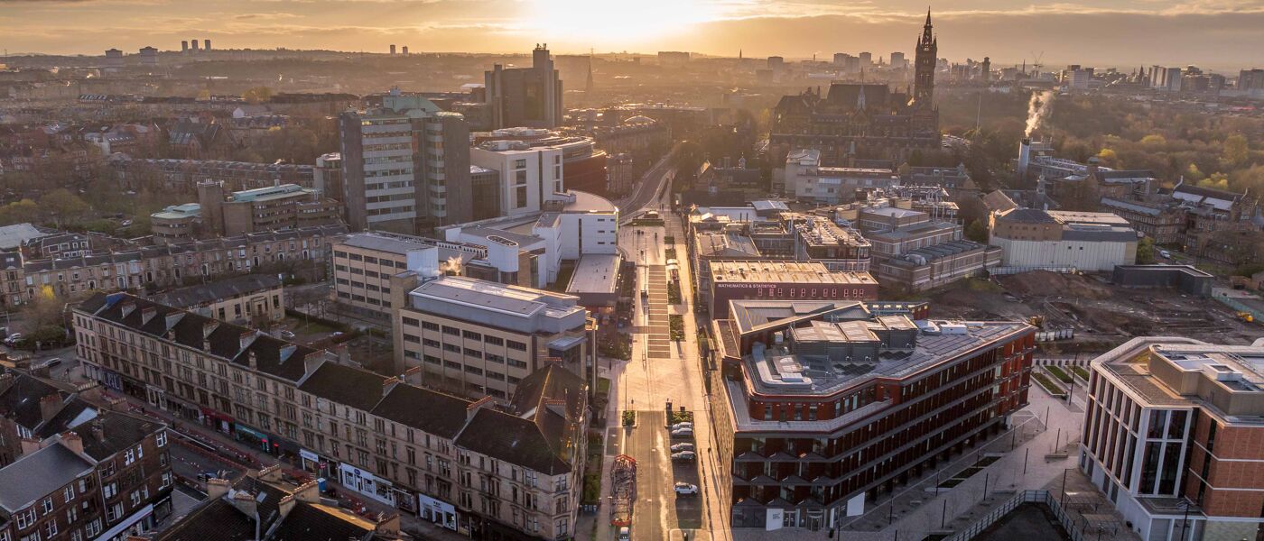 An aerial photo of the University of Glasgow campus at sunrise