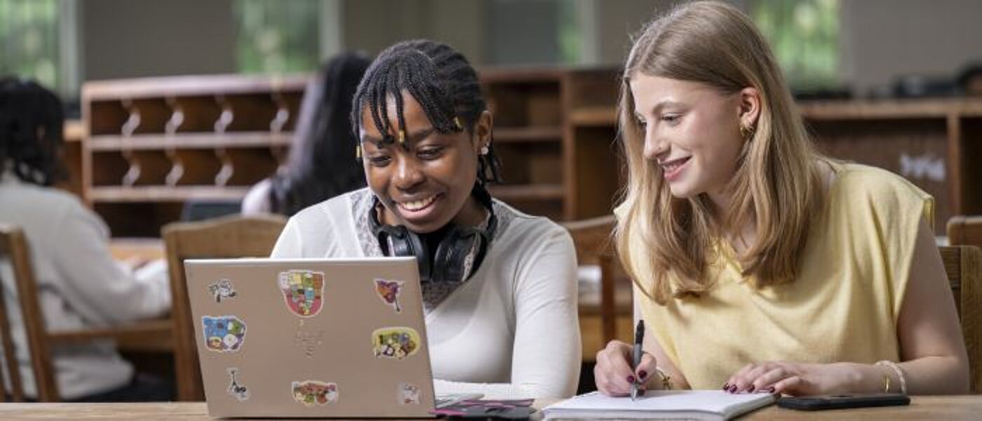 Two students studying together in the McMillan Round Reading Room