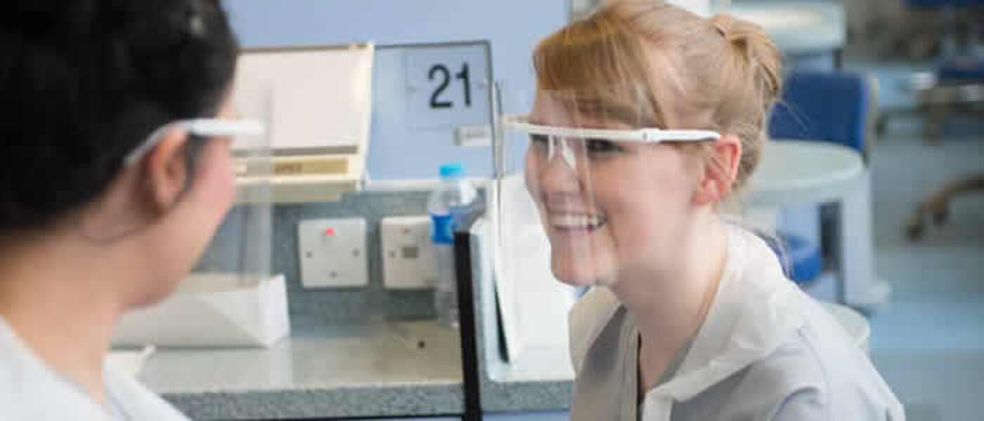 horizontal banner - two happy students interacting