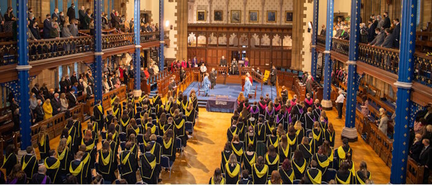 Graduates and parents in Bute Hall during Graduation