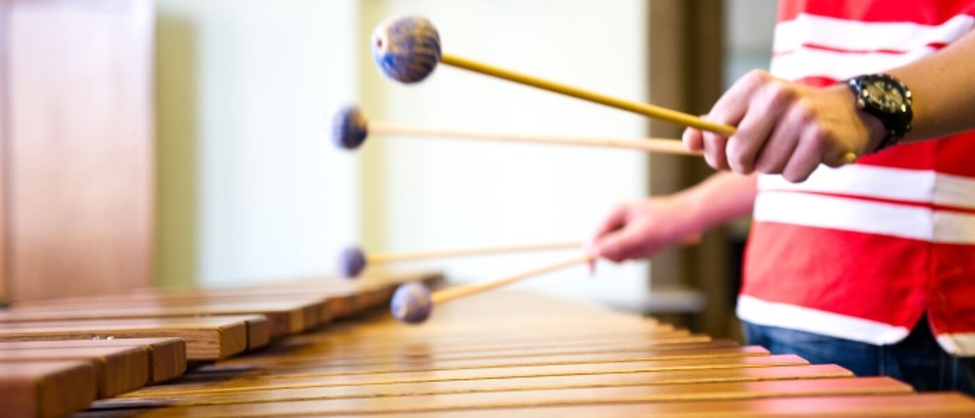 Music students playing xylophone