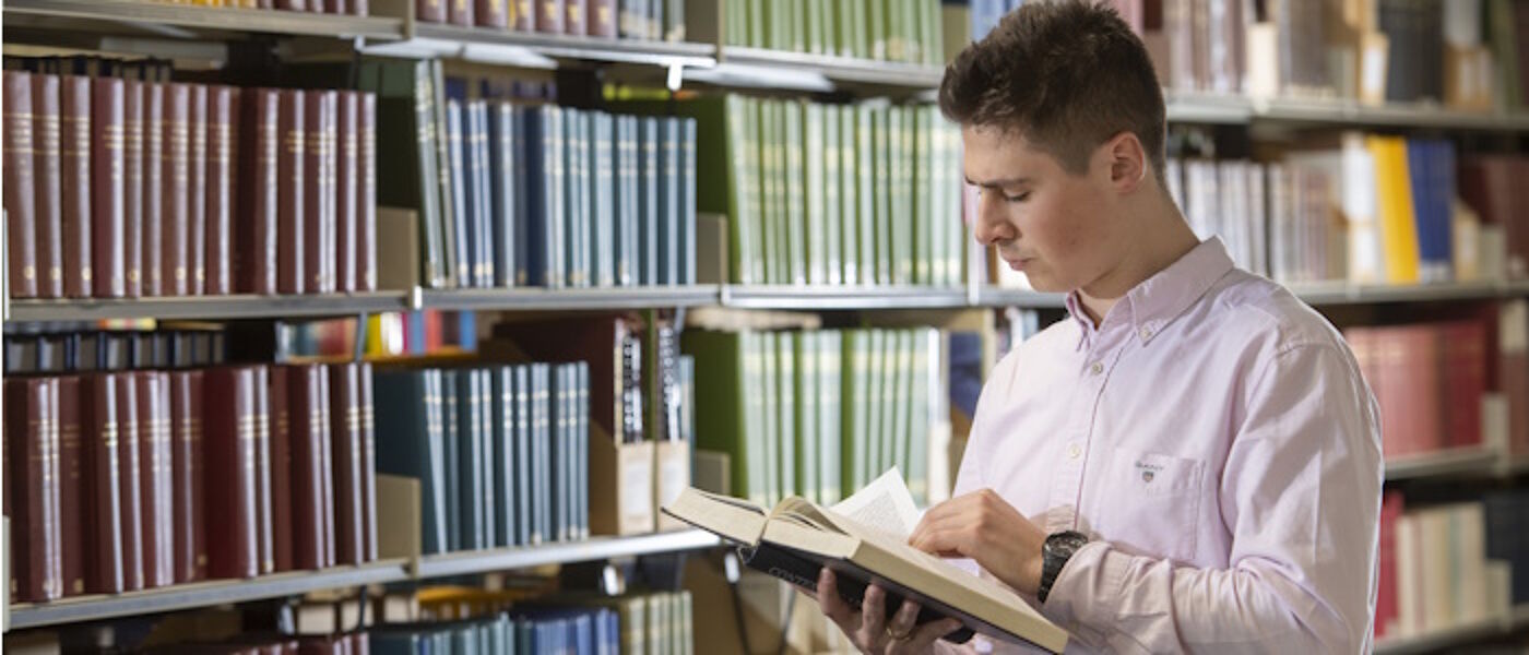 A student revising in the Library