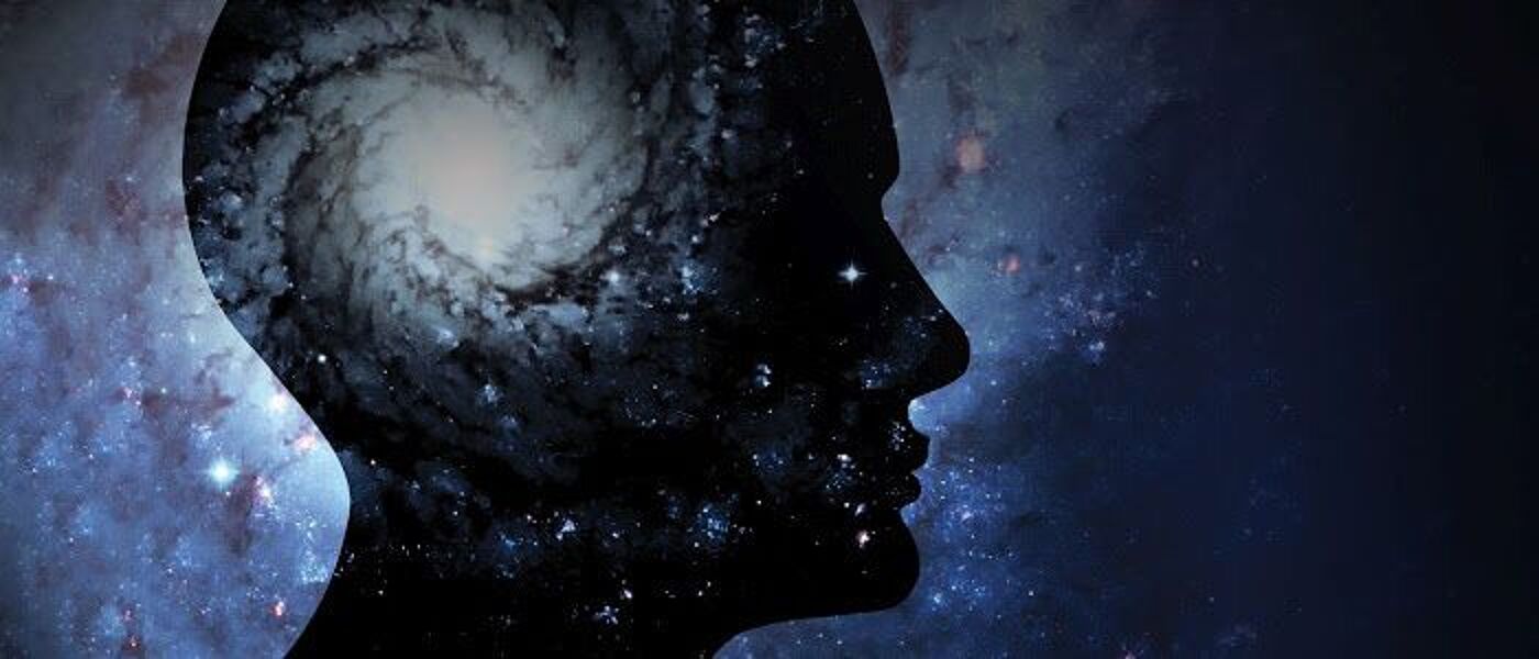 Graphic of profile of face on space-like background