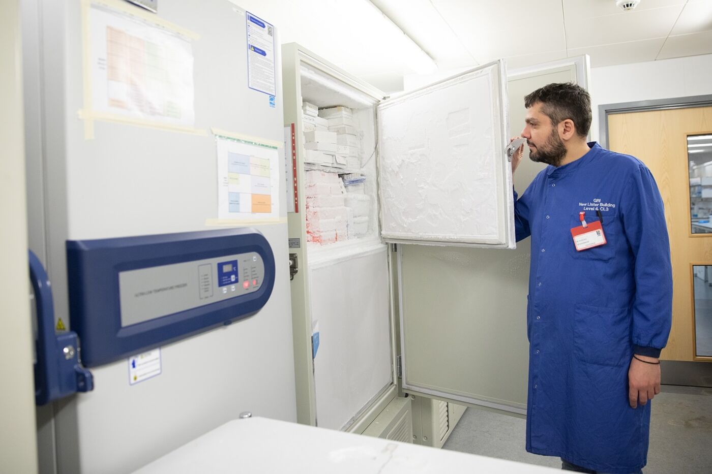 kostas next to freezer