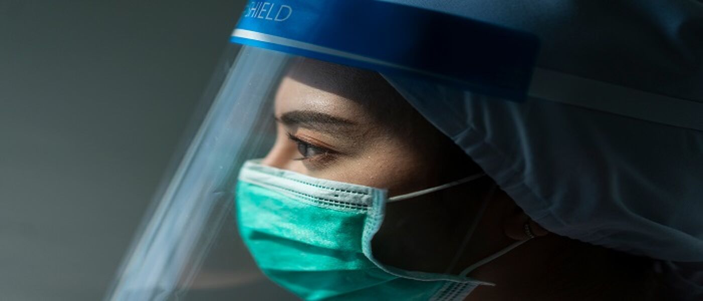 Woman in facial protection