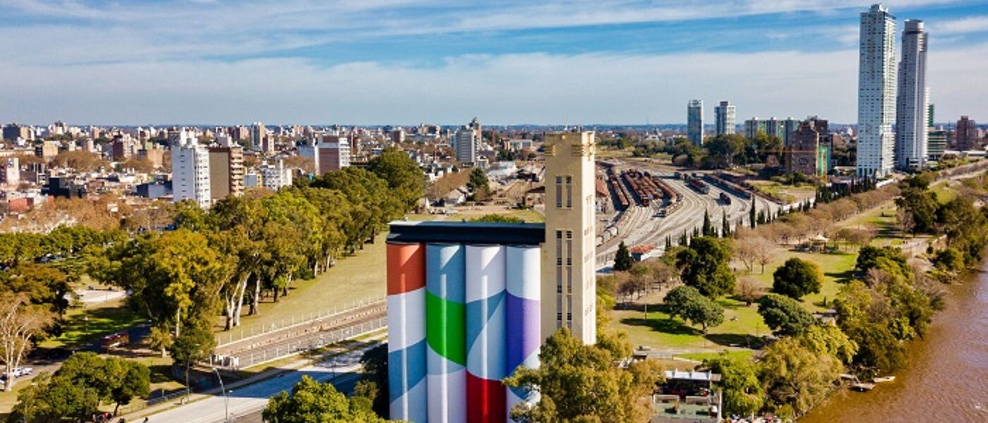 Railyard in cityscape with high rise towers